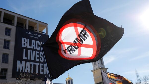 Anti-Trump flags are seen at Black Lives Matter plaza outside the White House in Washington, U.S., January 9, 2021 - Sputnik International