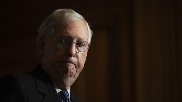Senator Mitch McConnell of Kentucky, pauses during a news conference with other Senate Republicans on Capitol Hill in Washington, Tuesday, 15 December 2020. - Sputnik International