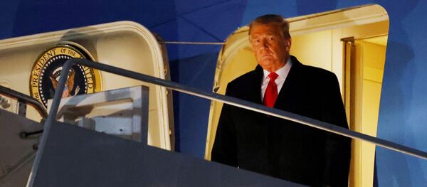 U.S. President Donald Trump disembarks from Air Force One at Joint Base Andrews in Maryland - Sputnik International