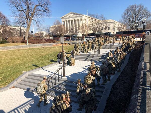 Additional National Guard forces arrive to bolster defences at the US Capitol.  - Sputnik International
