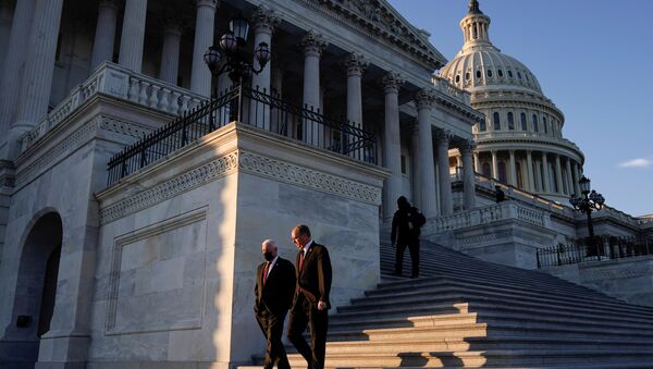 Members of the U.S. Congress depart after voting on impeachment against U.S. President Donald Trump at the U.S. Capitol, in Washington, U.S. January 13, 2021 - Sputnik International