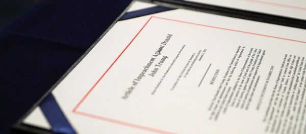 A close-up view of the article of impeachment against U.S. President Donald Trump, which U.S. House Speaker Nancy Pelosi (D-CA) will sign in an engrossment ceremony, at the U.S. Capitol in Washington January 13, 2021 - Sputnik International
