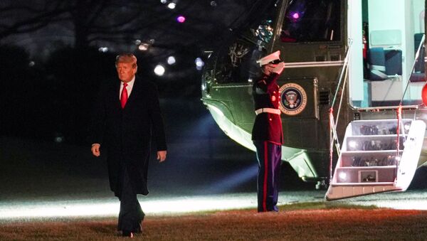 U.S. President Donald Trump walks from Marine One upon his return to the White House in Washington, U.S., January 12, 2021.   - Sputnik International