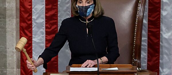 US House Speaker Nancy Pelosi (D-CA) presides over the vote to impeach President Donald Trump for a second time, a week after his supporters stormed the Capitol building, on the floor of the House of Representatives in Washington 13 January 2021. US House Speaker Nancy Pelosi (D-CA) presides over the vote to impeach President Donald Trump for a second time, a week after his supporters stormed the Capitol building, on the floor of the House of Representatives in Washington 13 January 2021. - Sputnik International