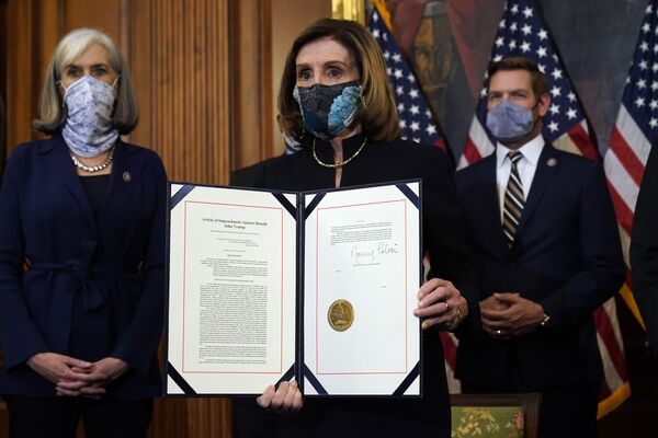 House Speaker Nancy Pelosi presents the signed article of impeachment against President Donald Trump in an engrossment ceremony before transmission to the Senate for trial on Capitol Hill, in Washington, Wednesday, 13 January 2021.  - Sputnik International