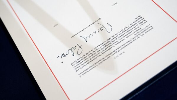 The signed article of impeachment against President Donald Trump sits on a table at the U.S. Capitol on 13 January 2021 in Washington, DC. The House of Representatives voted to impeach Trump a second time, after Vice President Mike Pence declined to use the 25th amendment to remove him from office after protestors breached the U.S. Capitol last week. - Sputnik International