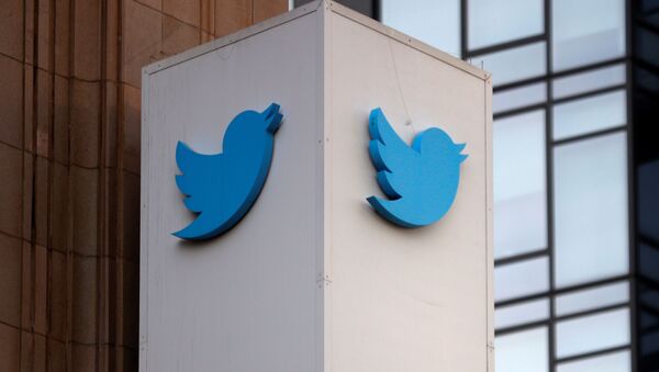 A Twitter logo is seen outside the company headquarters, during a purported demonstration by supporters of U.S. President Donald Trump to protest the social media company's permanent suspension of the President's Twitter account, in San Francisco, California, U.S., January 11, 2021 - Sputnik International
