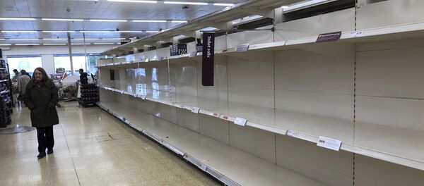 Empty shelves where toilet roll is usually stocked in a supermarket in Durham, England, Tuesday March 17, 2020, after British authorities ramped up public health measures Monday, telling people who are in the groups considered most vulnerable to severe COVID-19 illness to stay at home for three months - Sputnik International