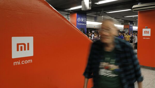 An advertisement for Xiaomi is displayed at a subway station in Hong Kong, 9 July 2018 - Sputnik International