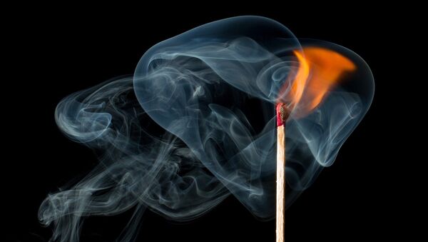 A match burns, creating a flame and smoke - Sputnik International