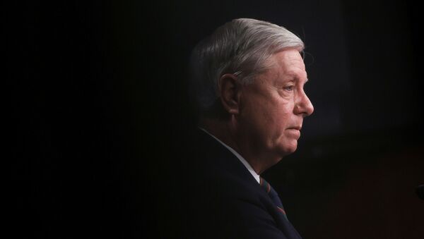 U.S. Senator Lindsey Graham (R-SC) attends a news conference a day after supporters of U.S. President Donald Trump occupied the Capitol building, in Washington, U.S. January 7, 2021 - Sputnik International