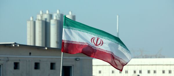 A picture taken on November 10, 2019, shows an Iranian flag in Iran's Bushehr nuclear power plant, during an official ceremony to kick-start works on a second reactor at the facility. - Bushehr is Iran's only nuclear power station and is currently running on imported fuel from Russia that is closely monitored by the UN's International Atomic Energy Agency. - Sputnik International