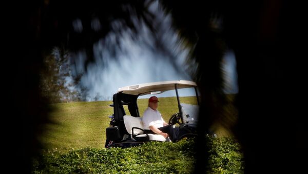 U.S. President Donald Trump plays golf at the Trump International Golf Club in West Palm Beach, Florida, U.S., December 28, 2020. - Sputnik International