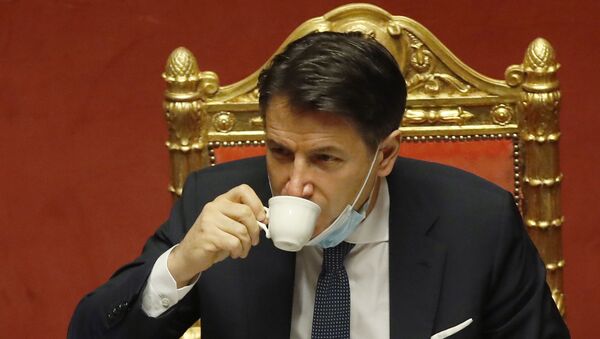 Italian premier Giuseppe Conte sips a coffee during a debate at the Senate prior to a confidence vote, in Rome, Tuesday, Jan. 19, 2021. - Sputnik International