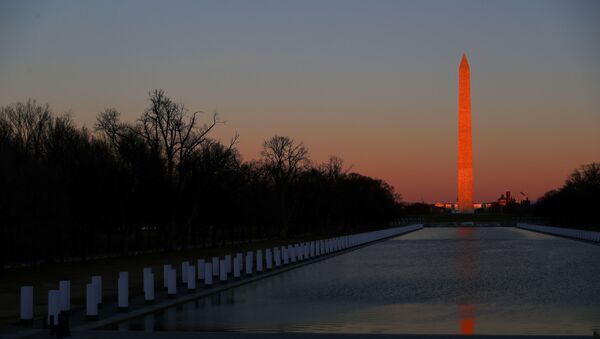 The sun sets on the National Mall ahead of U.S. President-elect Joe Biden's remarks at the Lincoln Memorial in Washington, U.S. January 19, 2021. - Sputnik International