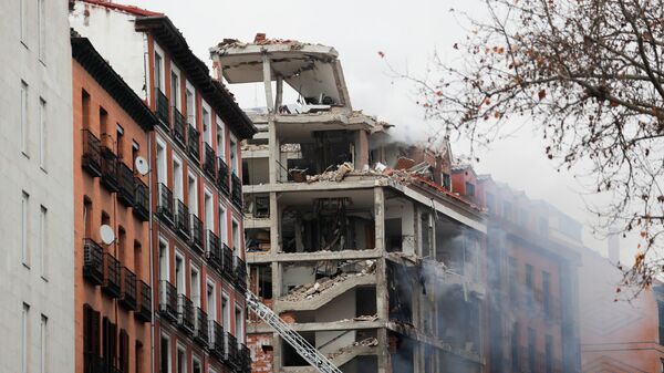 Smoke rises from a damaged building after an explosion in downtown Madrid, Spain, 20 January 2021. - Sputnik International