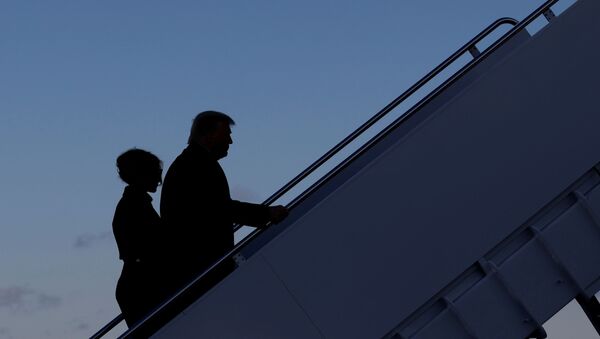 U.S. President Donald Trump departs next to first lady Melania Trump from the Joint Base Andrews, Maryland, U.S., January 20, 2021. - Sputnik International