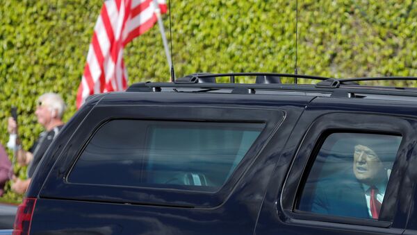 U.S. President Donald Trump reacts in a car as he drives past supporters in West Palm Beach, Florida, U.S., January 20, 2021.  - Sputnik International
