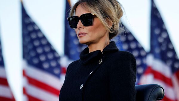Former first lady Melania Trump listens as her husband delivers remarks during his last speech as president at Joint Base Andrews, Prince George's County, Maryland, US, 20 January 2021. - Sputnik International