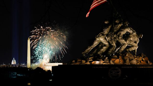 Fireworks are seen over the National Mall during the Celebrating America event at the Lincoln Memorial in Washington, after the inauguration of Joe Biden as the 46th President of the United States, in U.S., January 20, 2021 - Sputnik International
