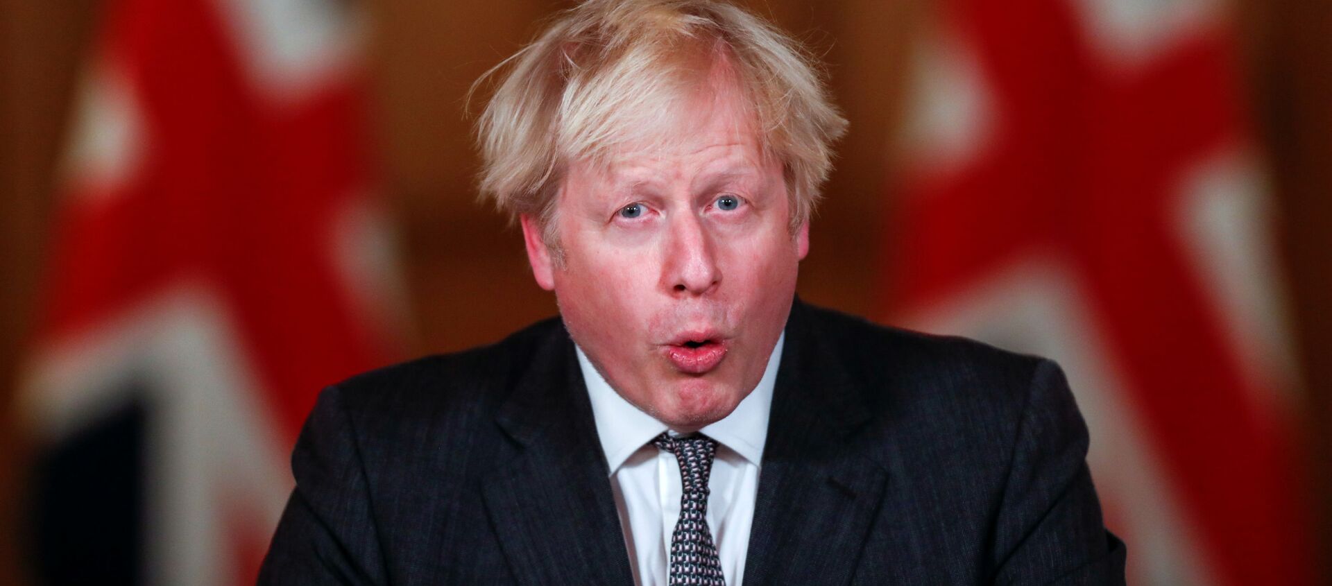 Britain's Prime Minister Boris Johnson speaks during a news conference announcing tightening of COVID-19 tiers, at Downing Street in London, Britain December 30, 2020.  - Sputnik International, 1920, 22.01.2021