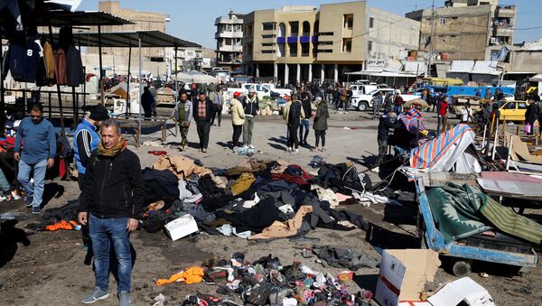 The site of a twin suicide bombing attack in a central market is seen in Baghdad, Iraq January 21, 2021. - Sputnik International