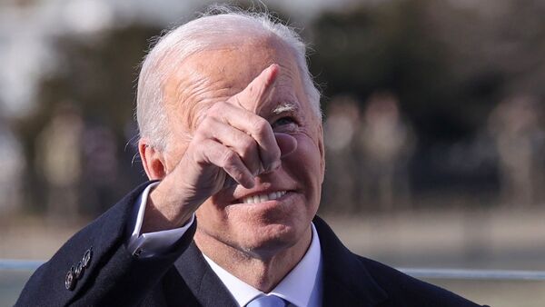 U.S. President Joe Biden looks up into the crowd during his inauguration as the 46th President of the United States on the West Front of the U.S. Capitol in Washington, U.S., January 20, 2021. - Sputnik International