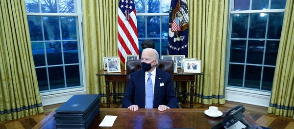 U.S. President Joe Biden signs executive orders in the Oval Office of the White House in Washington, after his inauguration as the 46th President of the United States, U.S., January 20, 2021. U.S. President Joe Biden signs executive orders in the Oval Office of the White House in Washington, after his inauguration as the 46th President of the United States, U.S., January 20, 2021. - Sputnik International