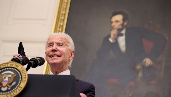 FILE PHOTO: With a portrait of former President Abraham Lincoln hanging in the background, U.S. President Joe Biden speaks about his administration's plans to fight the coronavirus disease (COVID-19) pandemic during a COVID-19 response event at the White House in Washington, DC, 21 January 2021.  - Sputnik International