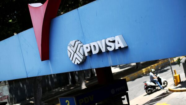 A state oil company PDVSA's logo is seen at a gas station in Caracas, Venezuela May 17, 2019. - Sputnik International