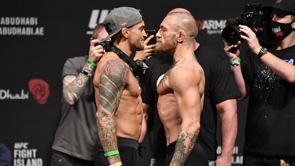 Dustin Poirier and Conor McGregor of Ireland face off during the UFC 257 weigh-in at Etihad Arena on UFC Fight Island on January 22, 2021 in Abu Dhabi, United Arab Emirates.  - Sputnik International