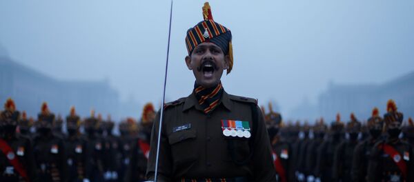 Army soldiers take part in the rehearsal for the Republic Day parade during the early morning, in New Delhi, India, 18 January 2021.  - Sputnik International
