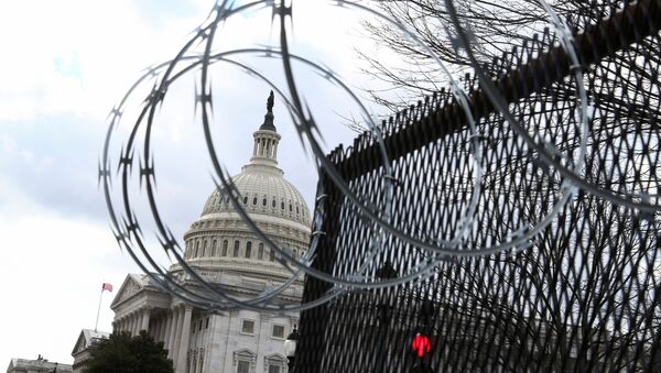 Barbed wire is seen on a fence as U.S. President-elect Joe Biden arrives at the U.S. Capitol for his inauguration as the 46th President of the United States, in Washington, U.S., January 20, 2021. - Sputnik International