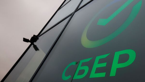 The logo is on display in an office of the Russian largest lender Sberbank in Moscow, Russia December 24, 2020. - Sputnik International