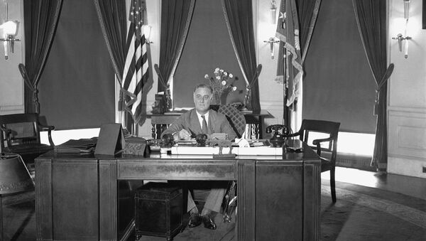 President Franklin D. Roosevelt is shown at his desk at the White House, 27 May 1933.   - Sputnik International