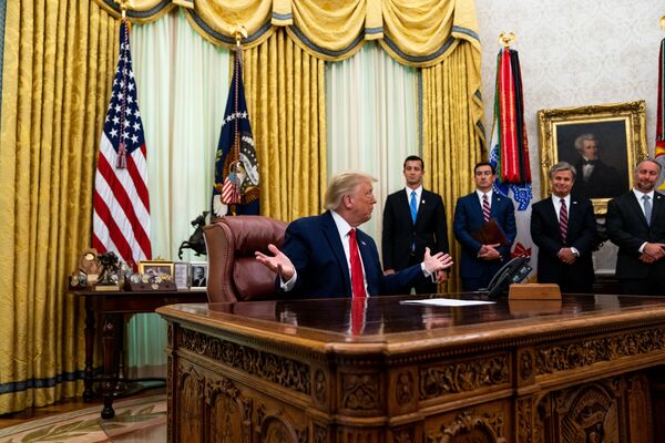 President Donald Trump addresses reporters in the Oval Office of the White House after receiving a briefing from law enforcement on Keeping American Communities Safe: The Takedown of Key MS-13 Criminal Leaders on 15th July 2020 in Washington DC.   - Sputnik International