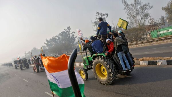 Farmers take part in a tractor rally to protest against farm laws on the occasion of India's Republic Day in Delhi - Sputnik International