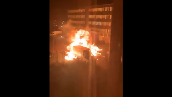 Screenshot from a video allegedly showing the explosion of a truck during protests against new coronavirus curfew restrictions in Osdorp, the Netherlands - Sputnik International