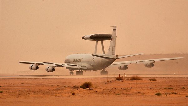 An E-3 AWACS aircraft deployed to the 363rd Air Expeditionary Wing takes off for a mission from Prince Sultan Air Base in Saudi Arabia during a sand storm March 25, 2003. - Sputnik International