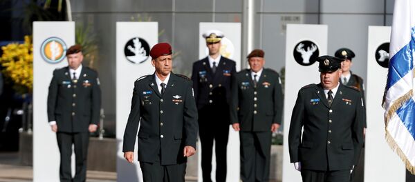 Incoming Israeli Chief of Staff Aviv Kohavi reviews an honour guard during a handover ceremony where he replaces Lieutenant-General Gadi Eizenkot, at the Defense Ministry in Tel Aviv, Israel January 15, 2019 Incoming Israeli Chief of Staff Aviv Kohavi reviews an honour guard during a handover ceremony where he replaces Lieutenant-General Gadi Eizenkot, at the Defense Ministry in Tel Aviv, Israel January 15, 2019 - Sputnik International