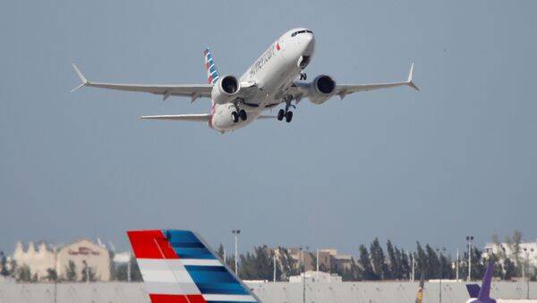 American Airlines flight 718, the first U.S. Boeing 737 MAX commercial flight since regulators lifted a 20-month grounding in November, takes off from Miami, Florida, U.S. December 29, 2020 - Sputnik International