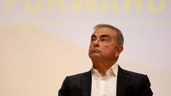 Carlos Ghosn, the former Nissan and Renault chief executive, looks on during a news conference at the Holy Spirit University of Kaslik, in Jounieh, Lebanon September 29, 2020 - Sputnik International