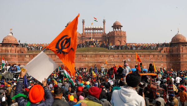 Farmers participate in a protest against farm laws introduced by the government, at the historic Red Fort in Delhi, India, January 26, 2021 - Sputnik International