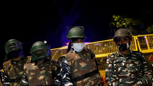 Paramilitary troops stand guard after an explosion near the Israeli embassy in New Delhi, India, 29 January 2021. - Sputnik International