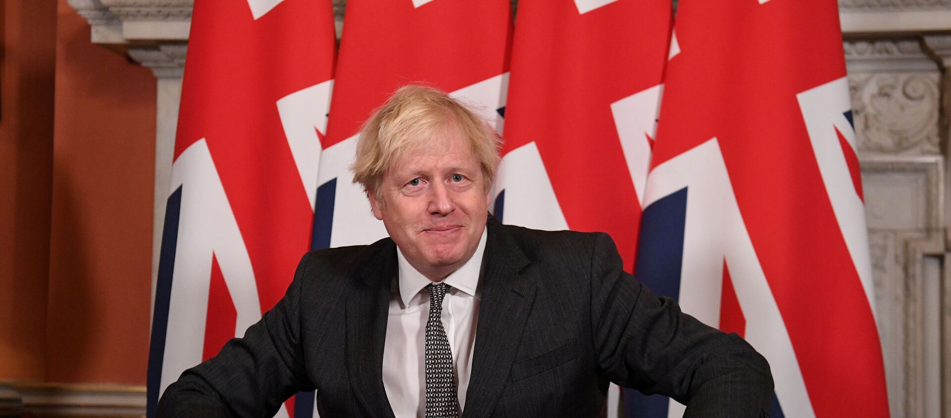 Britain's Prime Minister Boris Johnson reacts after signing the Brexit trade deal with the EU - Sputnik International, 1920, 12.02.2021