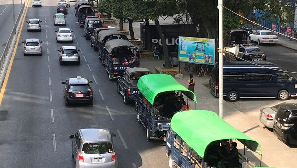 Myanmar police vehicles drive near City Hall in Yangon, Myanmar, 1 February 2021. - Sputnik International