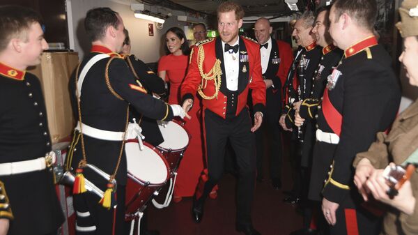 Britain's Prince Harry and Meghan, Duchess of Sussex, meet the Massed Bands of Her Majesty's Royal Marines at the Mountbatten Festival of Music at the Royal Albert Hall in London, Saturday, March 7, 2020 - Sputnik International