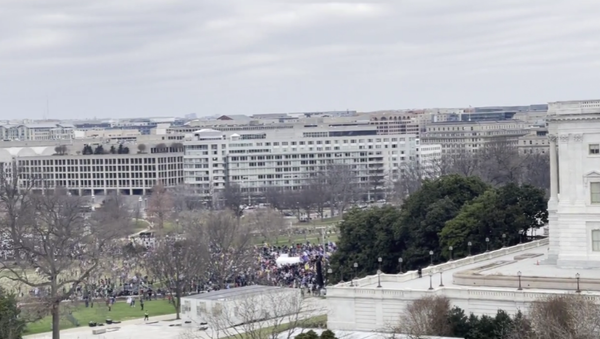 A view of the January 6 insurrection at the US Capitol from atop the Longworth House Office Building, as seen in a video posted to Parler by  Joel Valdez, an assistant to Rep. Matt Gaetz (R-FL) - Sputnik International