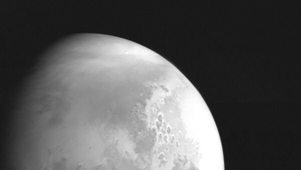 China's Tianwen-1 spacecraft snaps a photo of Mars at 2.2 million kilometers away - Sputnik International
