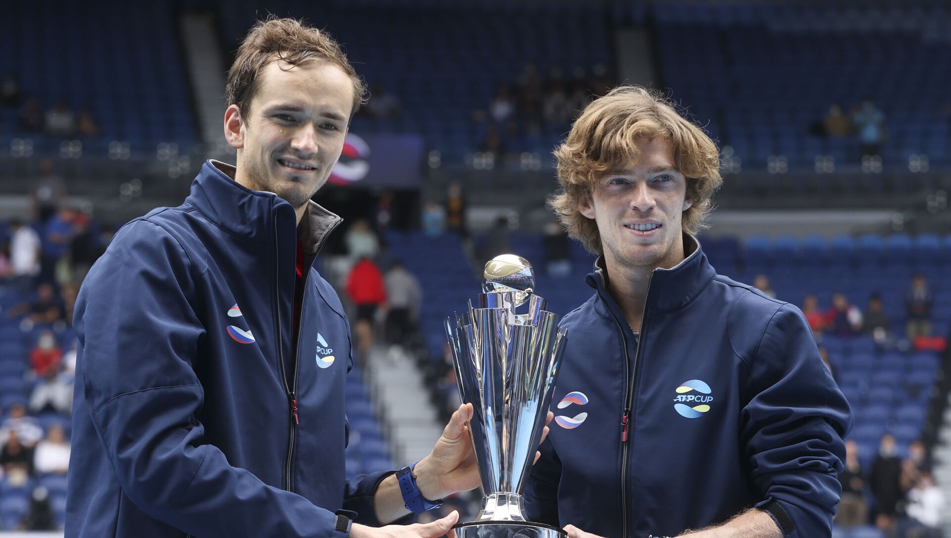 Russia's ATP Cup winners Daniil Medvedev, and Andrey Rublev, right, pose with their trophy after defeating Italy in the final in Melbourne, Australia, Sunday, Feb. 7, 2021. Russia's ATP Cup winners Daniil Medvedev, and Andrey Rublev, right, pose with their trophy after defeating Italy in the final in Melbourne, Australia, Sunday, Feb. 7, 2021. - Sputnik International, 1920, 07.02.2021